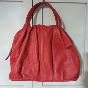 Puntotres genuine leather bag